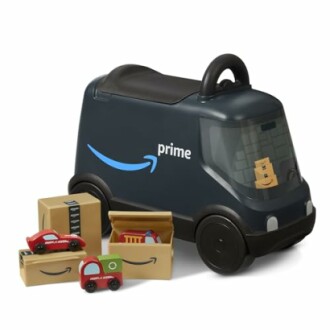 Amazon Prime toy delivery truck with packages and small toy cars.