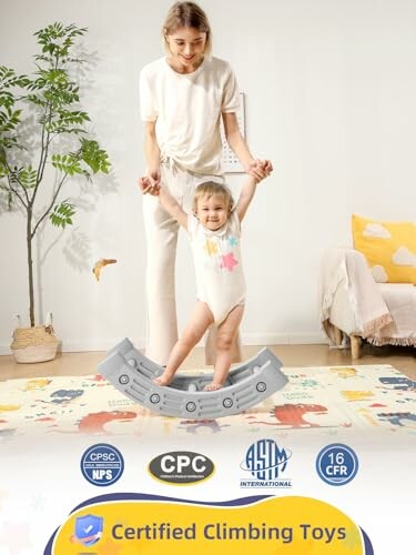 Child playing on a climbing toy with adult supervision.