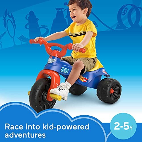 Child riding a toy bike with a race theme.