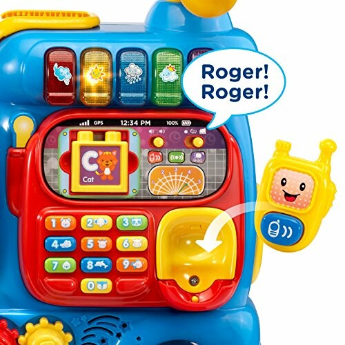 Colorful interactive toy phone with buttons and a small handheld device.