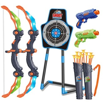 Kids archery toy set with bows, arrows, target stand, and water guns.