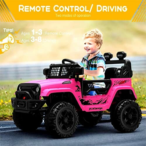 Child driving a pink remote control toy jeep on a track.