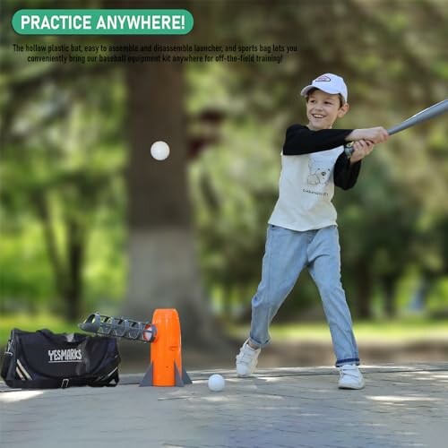 Child practicing baseball swing with portable kit outdoors.