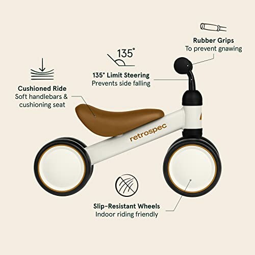 Toddler balance bike with cushioned ride, slip-resistant wheels, and rubber grips.