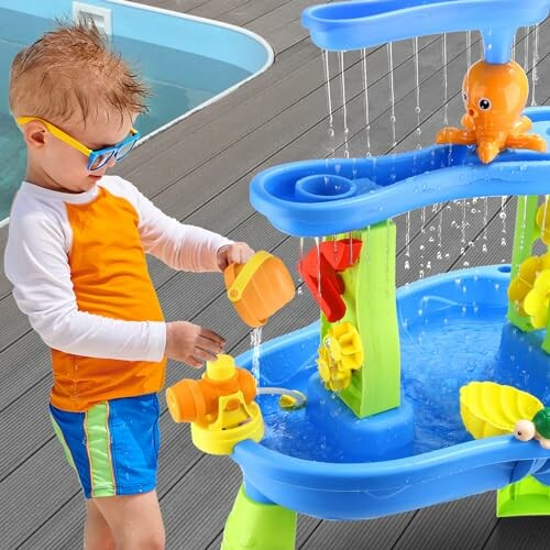 Child playing with colorful water activity table outdoors.
