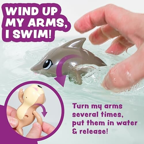 Wind-up swimming toy being demonstrated in water.
