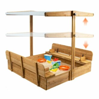 Wooden sandbox with adjustable canopy and toys.